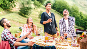 Friends having fun at a backyard bar-b-q