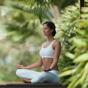 woman practicing yoga using medical cannabis