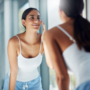 woman admiring skin