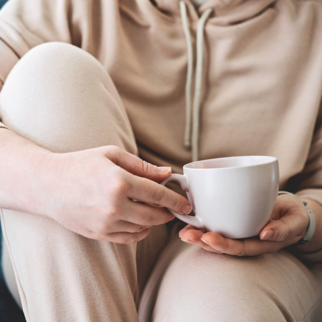 woman relaxing with a cup of tea